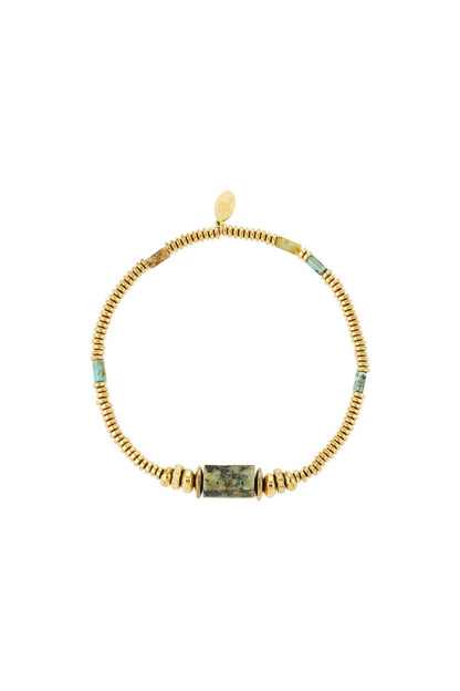 Goudkleurige elastische armband met ronde kralen en groene african pine steen
